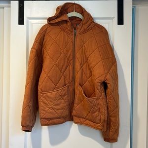 Quilted hooded orange sweatshirt